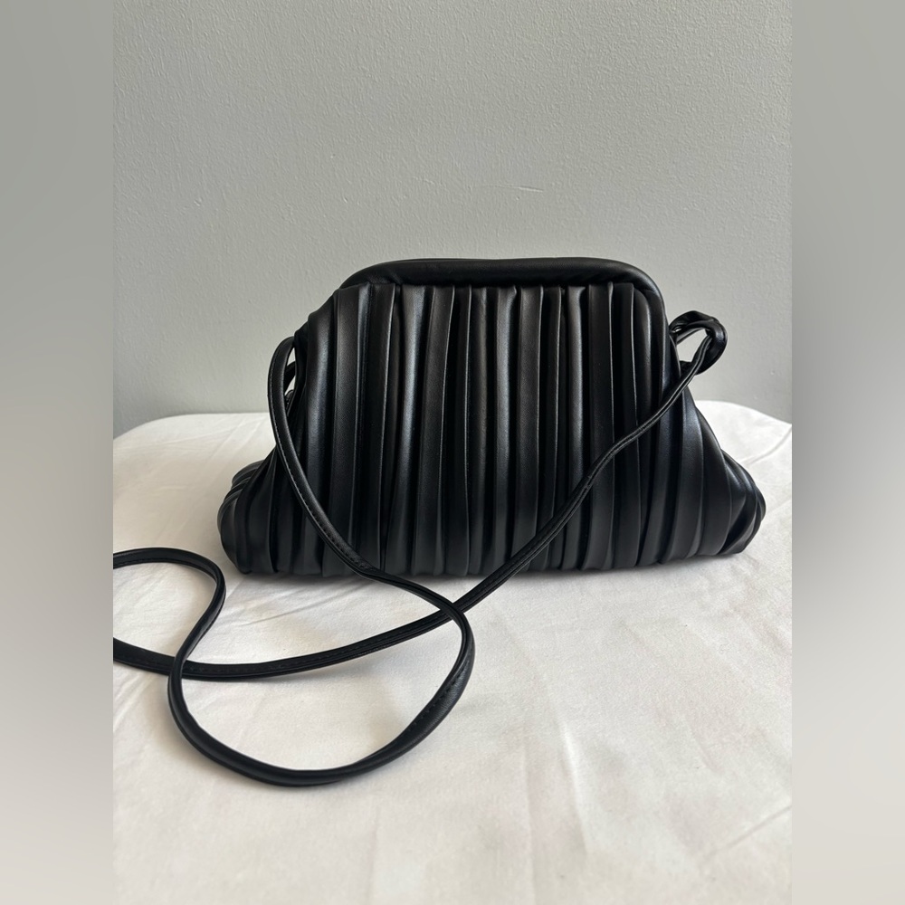 Pleated slouchy faux leather bag with removable adjustable tie strap